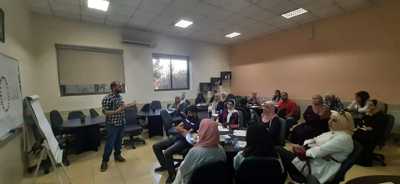 Delivering a training session to a full classroom of participants